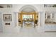 Open-concept living room with golf course views and elegant architectural details at 2936 Grasslands Dr, Lakeland, FL 33803