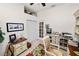 Well-lit office with stylish furniture, a floral area rug, and decor at 2936 Grasslands Dr, Lakeland, FL 33803
