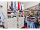 Organized walk-in closet featuring custom shelving, drawers, and ample storage for clothing and accessories at 2936 Grasslands Dr, Lakeland, FL 33803