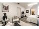 Bright bedroom with white walls, modern furnishings, and minimalist decor, offering a clean and serene retreat at 3020 Crews Lake Dr, Lakeland, FL 33813