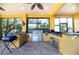 Outdoor kitchen with stainless steel appliances, countertops, and brick flooring at 3020 Crews Lake Dr, Lakeland, FL 33813