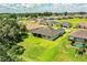 Expansive backyard and community featuring well-maintained lawns and mature landscaping at 3176 Pearly Dr, Lakeland, FL 33812