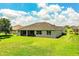 Beautifully kept backyard with large screened in patio, perfect for outdoor living at 3176 Pearly Dr, Lakeland, FL 33812