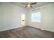 Bedroom suite with neutral walls, carpet, ceiling fan and lots of natural light from the window at 3176 Pearly Dr, Lakeland, FL 33812