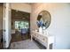 Inviting entryway features wood floors, decor, and an open view to the living spaces at 3176 Pearly Dr, Lakeland, FL 33812