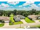 Attractive single-story home with paver driveway, landscaped yard, and classic architectural details at 3176 Pearly Dr, Lakeland, FL 33812