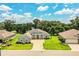 Stunning single-story home featuring a paver driveway, lush lawn, and decorative stone accents at 3176 Pearly Dr, Lakeland, FL 33812