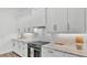 Bright kitchen features subway tile backsplash, quartz countertops, and stainless steel appliances at 3176 Pearly Dr, Lakeland, FL 33812