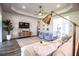 This inviting living room has wood floors and recessed lighting, perfect for relaxing or entertaining at 3176 Pearly Dr, Lakeland, FL 33812