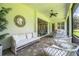 Cozy screened-in patio featuring comfortable seating and stylish decor, perfect for relaxation and entertaining at 3176 Pearly Dr, Lakeland, FL 33812