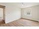 This naturally lit bedroom has modern laminate flooring and freshly painted walls, creating a bright and airy space at 3618 Highland Fairways Blvd, Lakeland, FL 33810