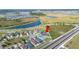 Home's prime location highlighted by its proximity to community lakes, amenities and a main thoroughfare at 3883 Sandhill Crane Dr, Lakeland, FL 33811
