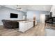 Well-lit open layout combining kitchen, living, and dining areas at 3883 Sandhill Crane Dr, Lakeland, FL 33811