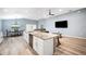 Large kitchen island open to kitchen, dining and Gathering room at 3883 Sandhill Crane Dr, Lakeland, FL 33811