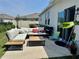Cozy backyard patio with a comfortable outdoor sofa, perfect for relaxing and entertaining guests at 3966 Willowbrook Dr, Edgewater, FL 32141