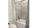Bathroom boasts tile shower with glass door, offering a clean and modern design at 3966 Willowbrook Dr, Edgewater, FL 32141