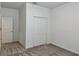 This bedroom has neutral walls, plush carpet, and a closet with bifold doors at 3966 Willowbrook Dr, Edgewater, FL 32141