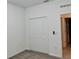 This bedroom has neutral walls, plush carpet, and a closet with bifold doors at 3966 Willowbrook Dr, Edgewater, FL 32141