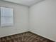 This bedroom features a cozy carpet and a window for ample natural light at 3966 Willowbrook Dr, Edgewater, FL 32141