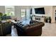Cozy living room with stylish furnishings and plenty of natural light, creating an inviting atmosphere at 3966 Willowbrook Dr, Edgewater, FL 32141