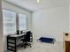 Well-lit office space with a desk and chair, perfect for a home office setup or study area at 3966 Willowbrook Dr, Edgewater, FL 32141