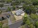 Aerial view of a charming single Gathering home with a fenced in yard and mature trees at 417 El Salvador Dr, Lakeland, FL 33809