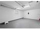 This well lit two car garage has a small window at 417 El Salvador Dr, Lakeland, FL 33809