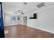 Spacious living room with hardwood floors and ceiling fan at 417 El Salvador Dr, Lakeland, FL 33809