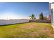 Large fenced-in backyard with a mix of grass and trees at 436 Lady Diana Dr, Davenport, FL 33837