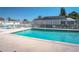 Large refreshing community pool with white fence, ideal for swimming laps or relaxing by the water at 436 Lady Diana Dr, Davenport, FL 33837