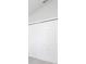 Bedroom closet features a double-door entry with a white painted finish at 4486 Rapallo Ave, Winter Haven, FL 33884