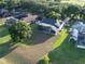 Expansive lot with mature trees surrounding a home with screened-in porch at 4808 Juliana Reserve Dr, Auburndale, FL 33823