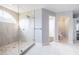 Elegant bathroom with glass shower, modern fixtures, and tile flooring at 4808 Juliana Reserve Dr, Auburndale, FL 33823