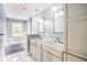 Bathroom featuring dual sinks, granite countertops, tile flooring, tub, and shower at 4808 Juliana Reserve Dr, Auburndale, FL 33823