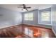 Bedroom with hardwood flooring, natural light, ceiling fan, and neutral walls at 4808 Juliana Reserve Dr, Auburndale, FL 33823