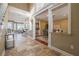 Bright and open foyer leads into a dining room and kitchen and features a staircase to the upper level at 4808 Juliana Reserve Dr, Auburndale, FL 33823