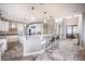 Large kitchen with a high ceiling and a breakfast bar that overlooks the dining room at 4808 Juliana Reserve Dr, Auburndale, FL 33823