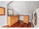 Laundry room with built-in counterspace and wood cabinets at 4808 Juliana Reserve Dr, Auburndale, FL 33823