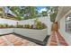 This backyard features custom hardscape and planting beds at 4825 Foxrun, Lakeland, FL 33813