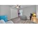 Bedroom featuring a ceiling fan, closet, wood floors, and neutral walls at 4825 Foxrun, Lakeland, FL 33813
