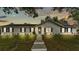 Charming single-story home with white siding, blue shutters, a manicured lawn, and a concrete walkway at 4825 Foxrun, Lakeland, FL 33813