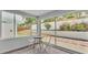 Inviting sun room features sliding windows, views of outdoor garden and patio set at 4825 Foxrun, Lakeland, FL 33813
