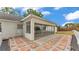 This sunroom features lots of windows, beautiful hardscape, and privacy at 4825 Foxrun, Lakeland, FL 33813