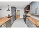 Beautiful updated kitchen features granite countertops and stainless steel appliances at 509 Rob Roy St, Lakeland, FL 33813