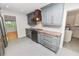Beautiful kitchen with custom cabinets, granite countertops, stainless steel appliances and tile flooring at 509 Rob Roy St, Lakeland, FL 33813
