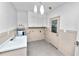 This laundry room has a sink, water heater, storage, and back door at 509 Rob Roy St, Lakeland, FL 33813