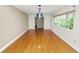 Bright living room featuring hardwood floors and an abundance of natural light at 509 Rob Roy St, Lakeland, FL 33813