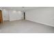Spacious living room with neutral paint, laminate floors and white trim at 509 Rob Roy St, Lakeland, FL 33813