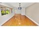 Bright living room featuring hardwood floors and a large window with a view at 509 Rob Roy St, Lakeland, FL 33813