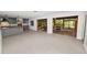 Open floor plan featuring updated kitchen, fireplace and brick flooring at 509 Rob Roy St, Lakeland, FL 33813